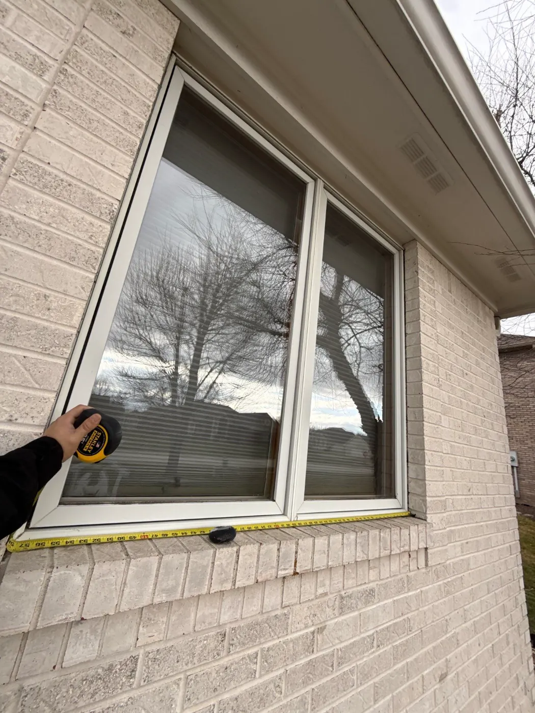 Frame and seal detail on a Brookshire window job